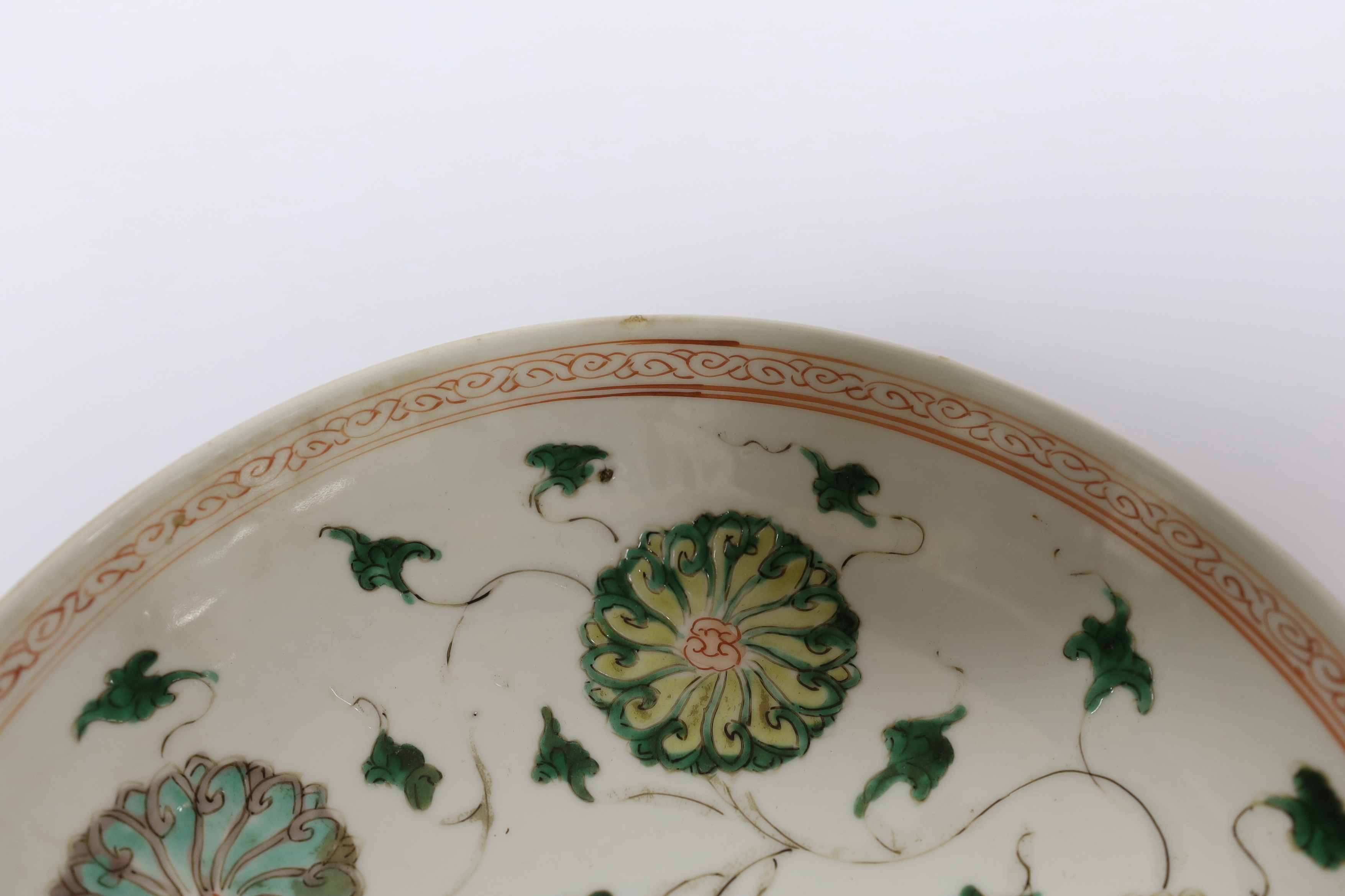 A Chinese famille verte ‘lotus flower’ dish, Kangxi period, 23cm diameter